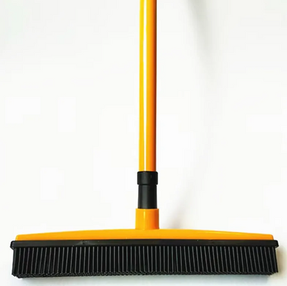 rubber bristle pet hair broom collecting dog fur from carpet